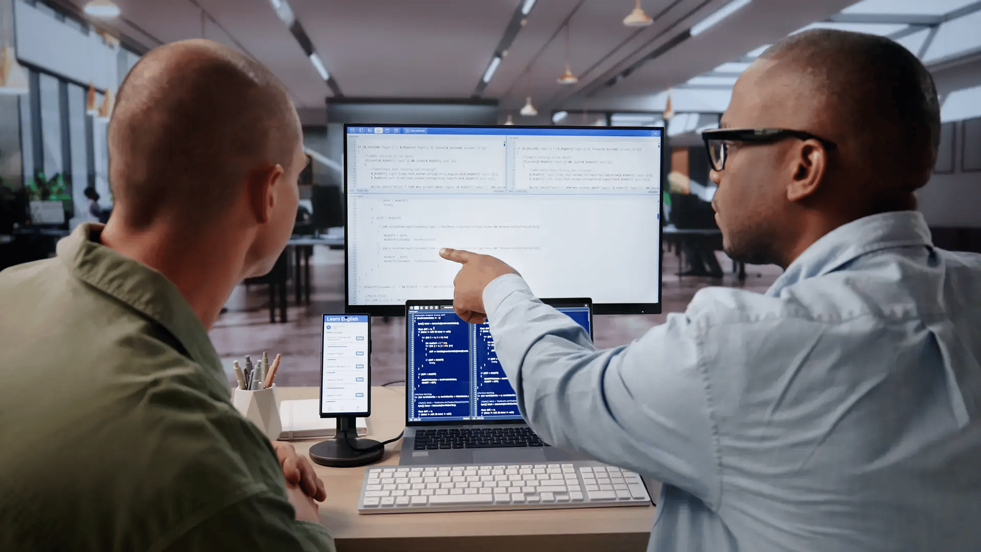 Two telecom engineers working together