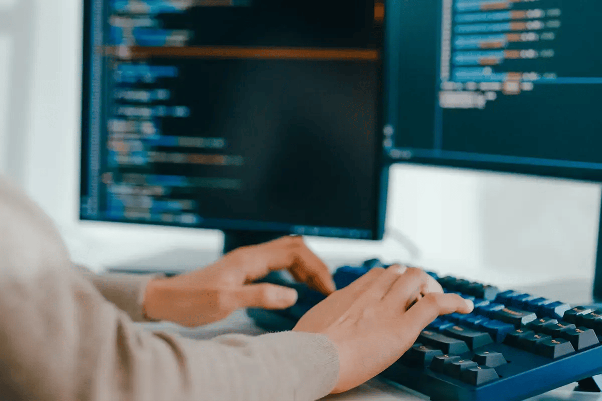 Developer Hands on Keyboard working with code and algorithms