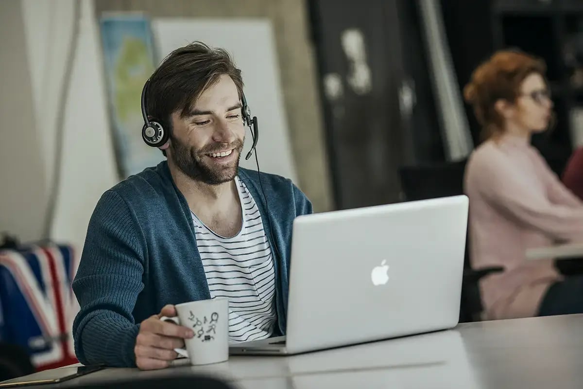 Middle-aged man working with Performance Management Data