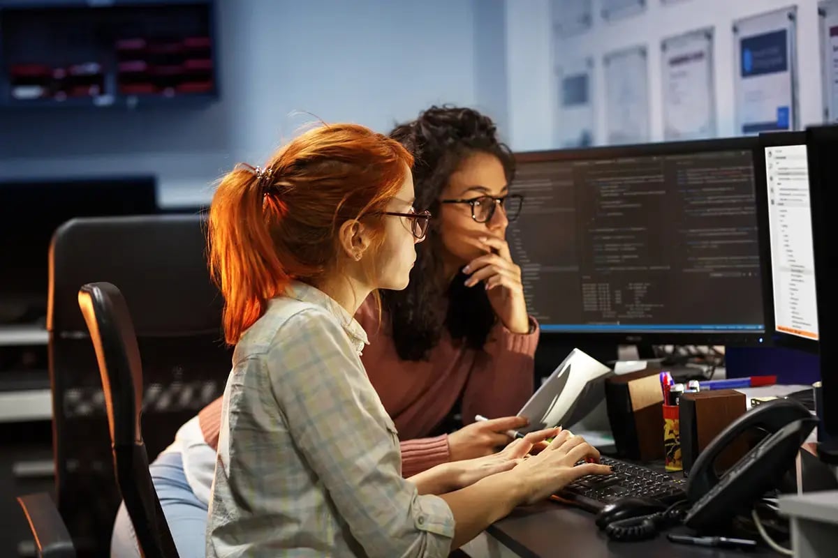 Two women engineers working with Cross Domain Event Correlation