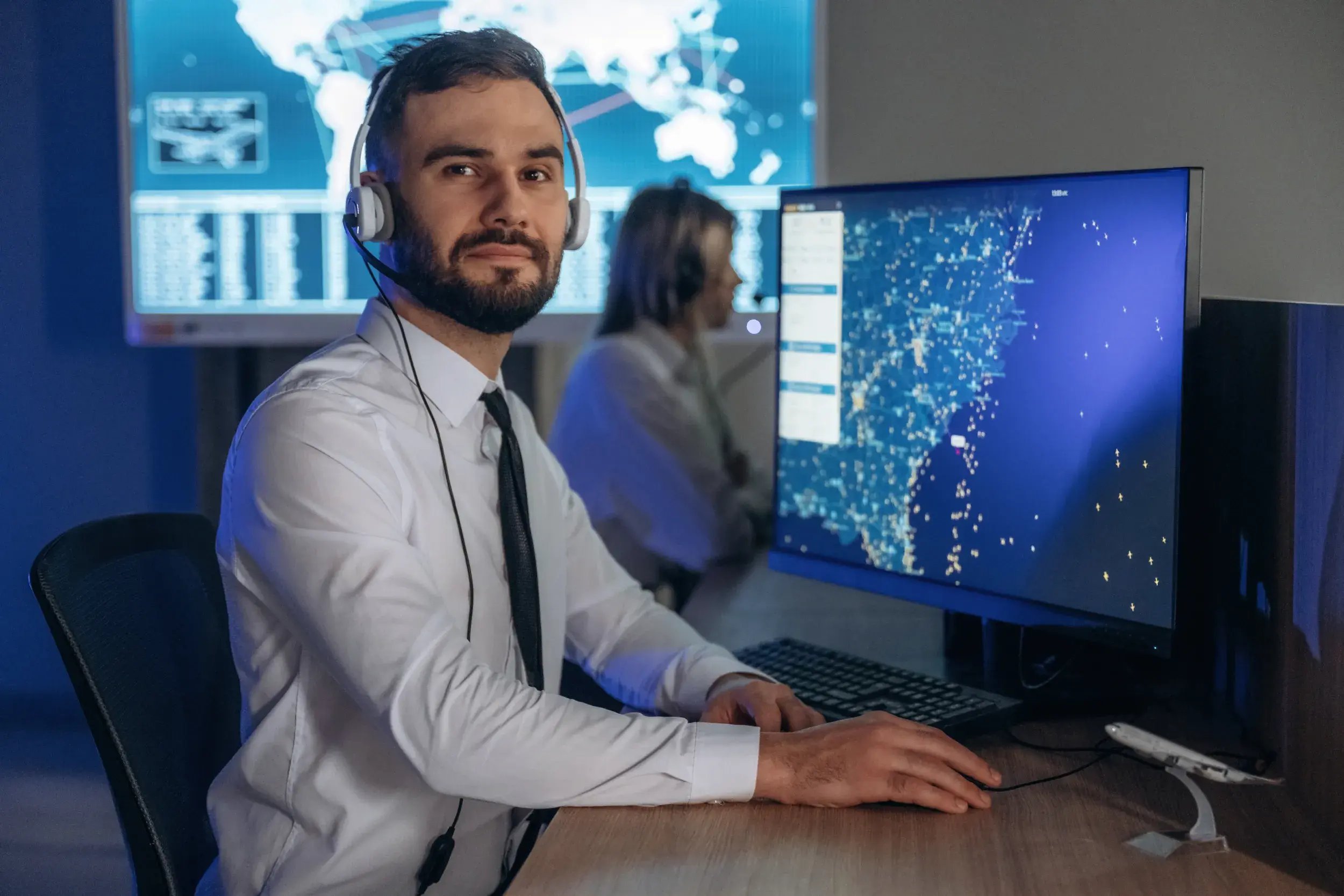 looking-camera-people-are-working-by-computers-airline-company