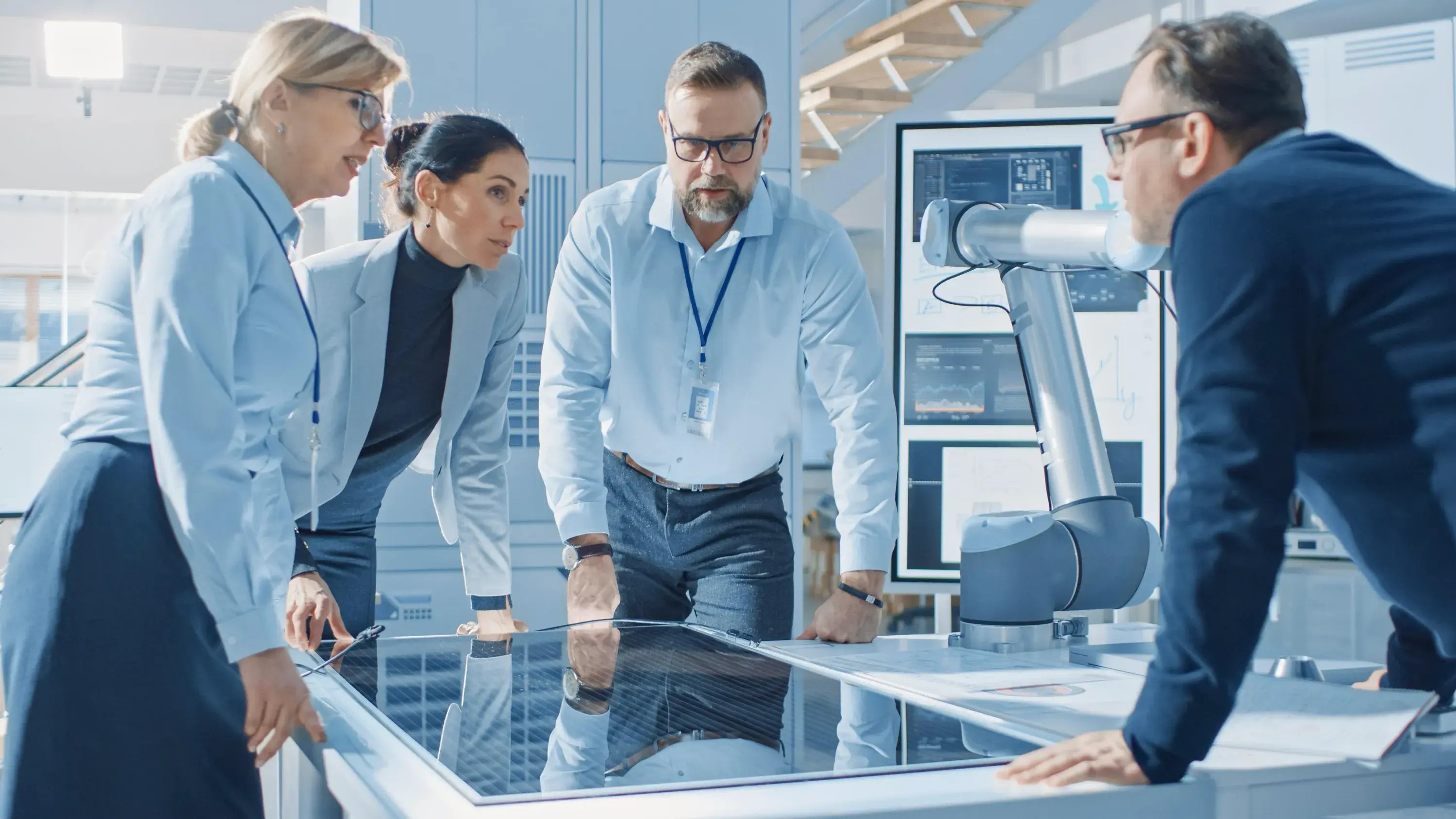 group-people-looking-glass-table-with-robot-it
