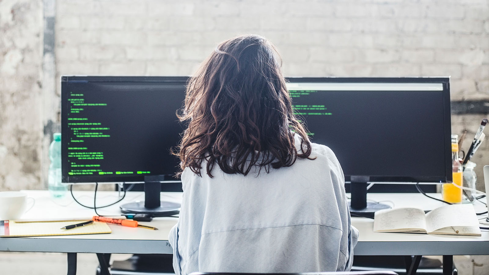 Woman working with network monitoring and troubleshooting