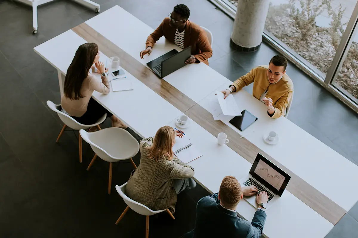 Telecom Engineers in a Meeting about Network Monitoring