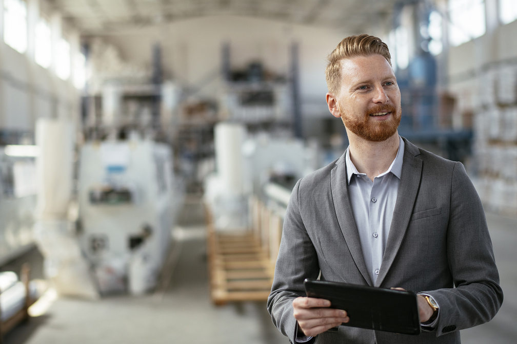 sedApta_Images_Young red hair inspector in factory._iStock-1192473870