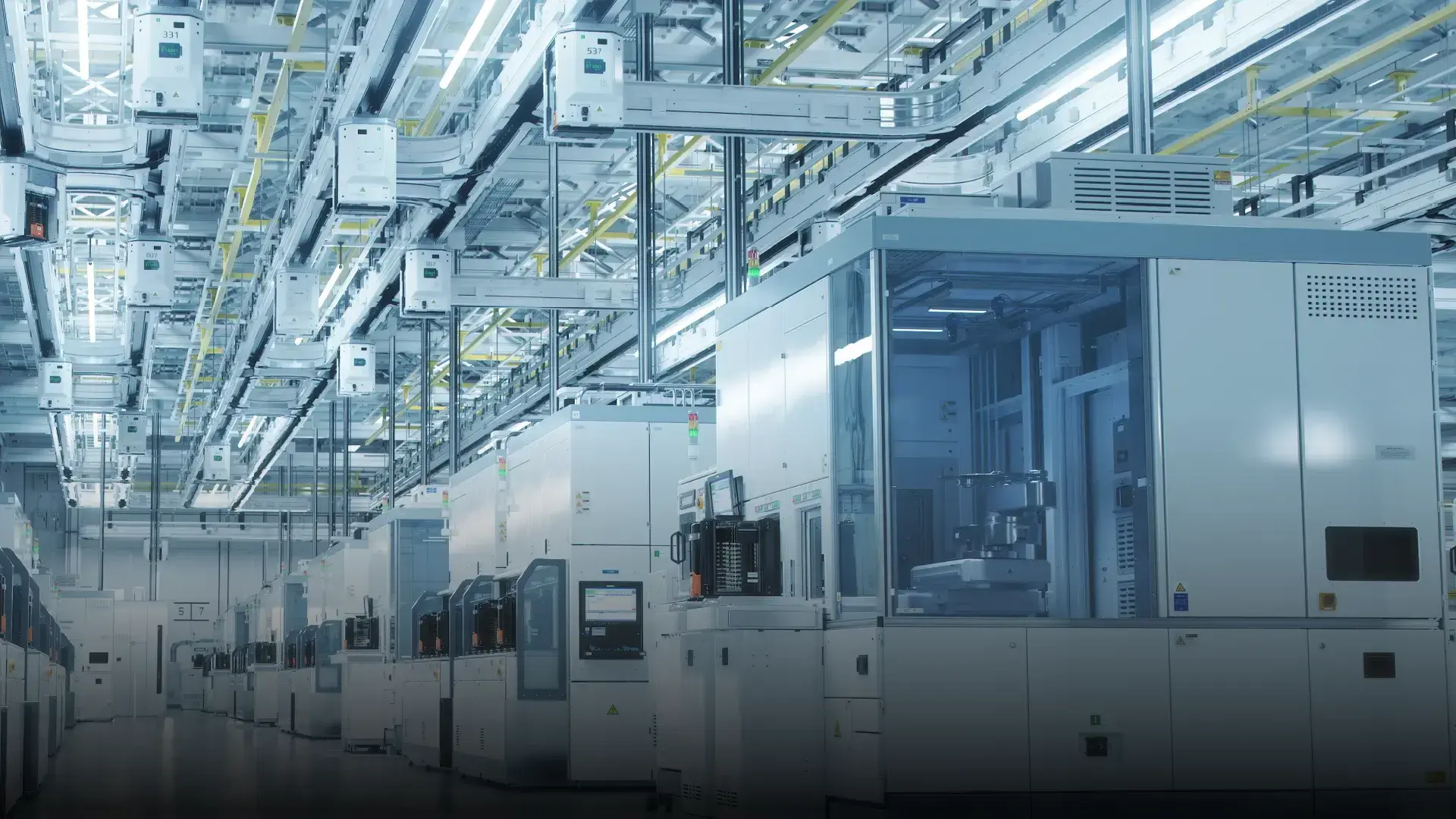 Semiconductor production line with advanced machinery in a cleanroom environment.